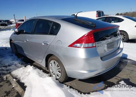 2010 Honda Insight Lx z USA, uszkodzony, nr VIN JHMZE2H51AS042038